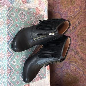 Black booties with front zips